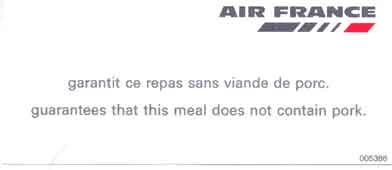 A scan of an Air France note indicating "guarantees that this meal does not contain pork" in French and English