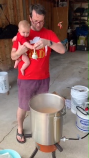 Pete and JB getting ready to add hops to brew kettle