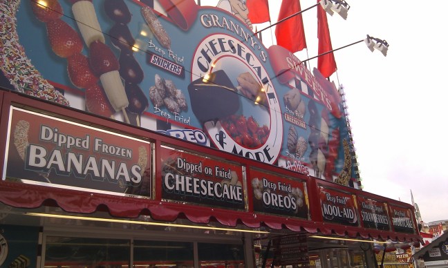 Stand offering deep fried oreos and other similar healthy food