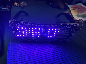LED Glasses with "W3RD" scrolling across them